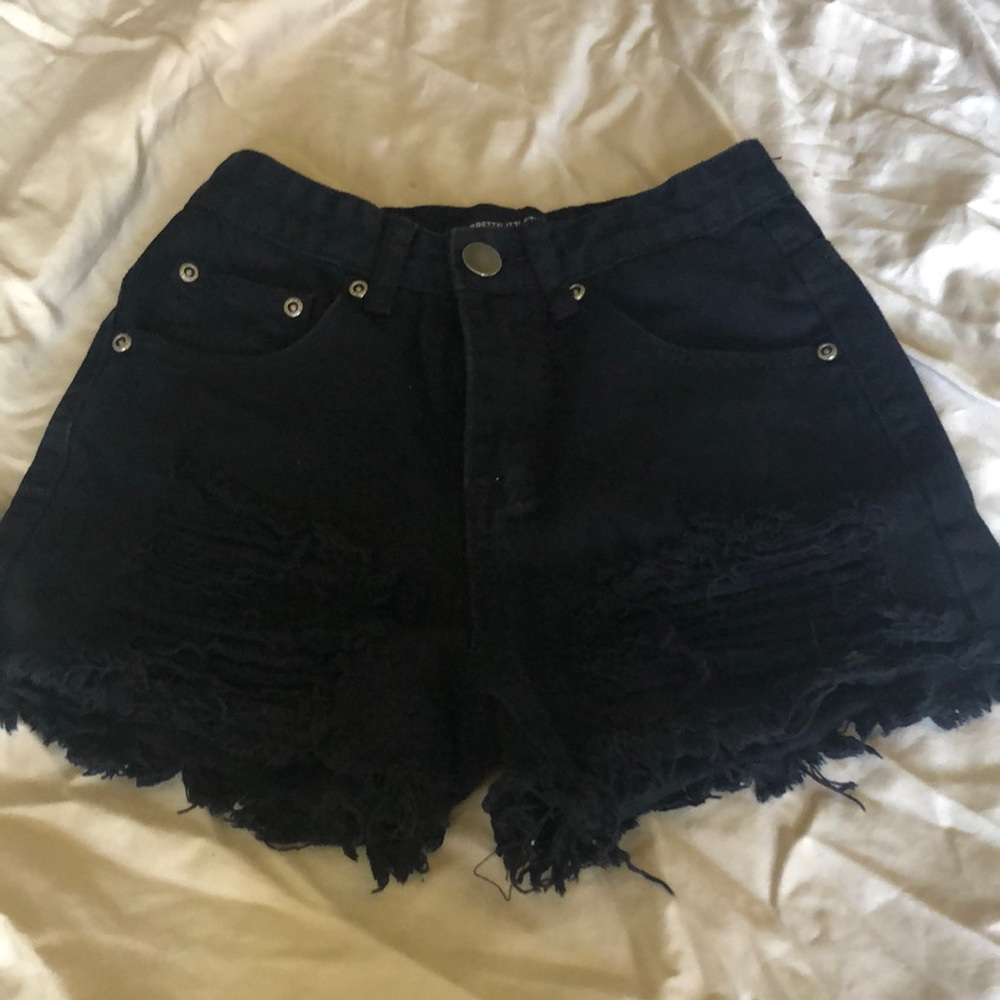 High waisted ripped up shorts